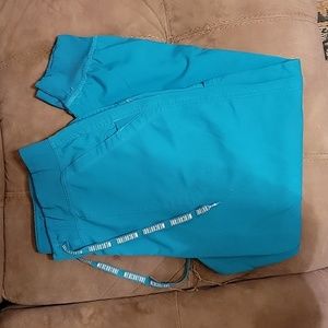 Worn teal med couture scrub pants size M petite